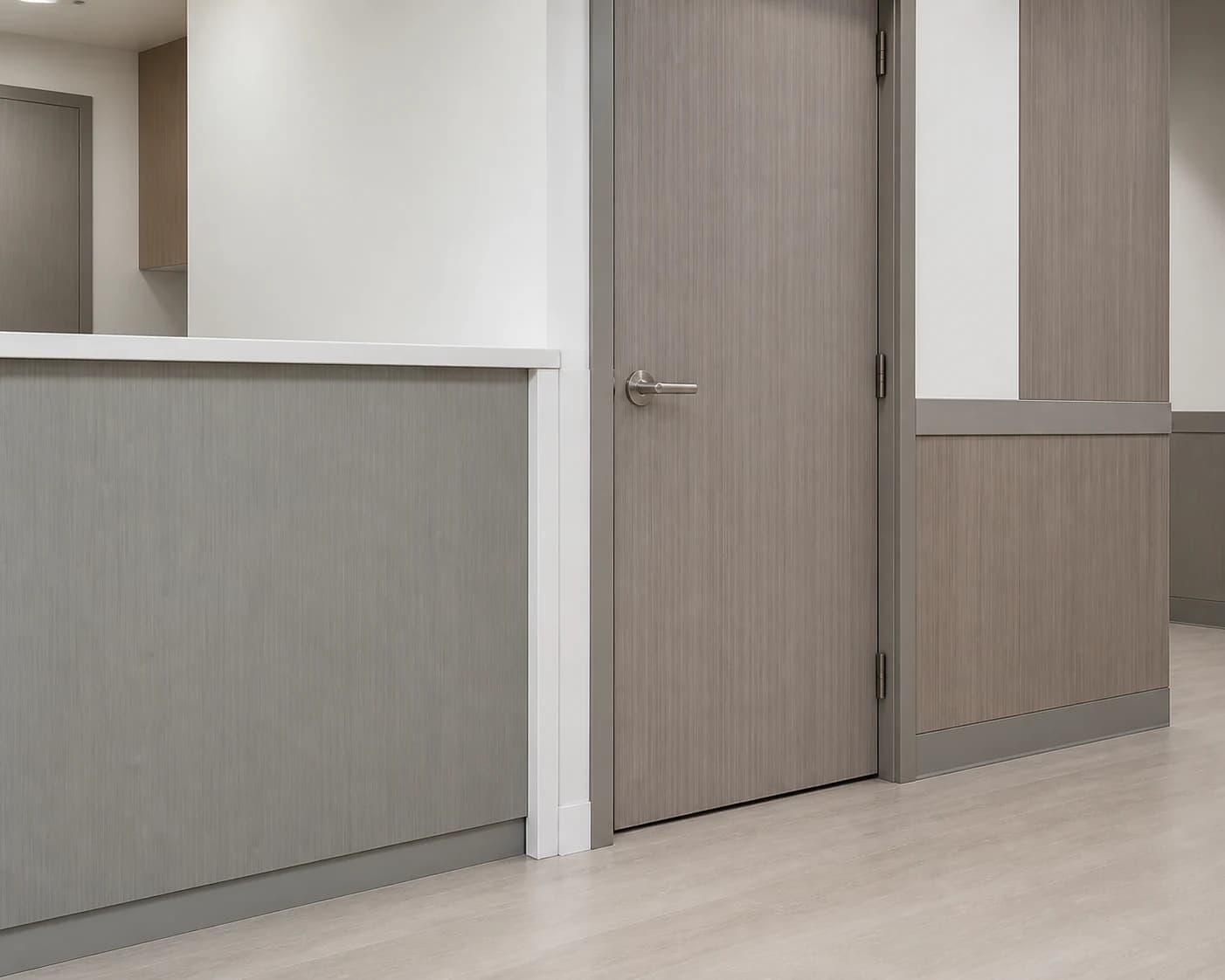 Healthcare circulation renewal concept with light-wood doors and soft-white and cool-gray panels